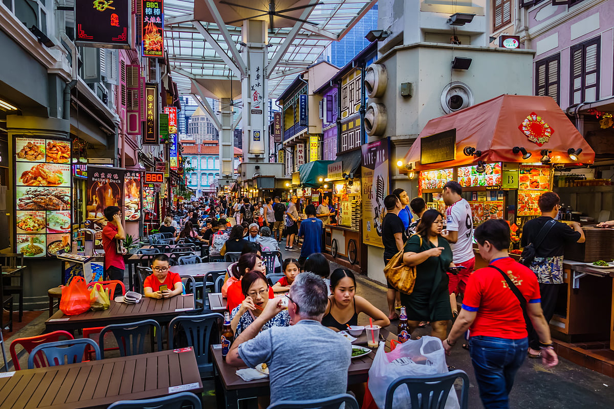 Sample as many dishes as you can at the various hawker centres